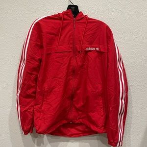 New Adidas Windbreaker. Good condition, red/white color way. Size: Medium.
